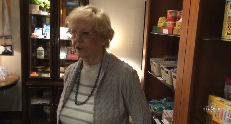 Elderly woman give a testimonial